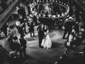 In the barn, guests under the large iron chandeliers, Elvira Kalviste photo